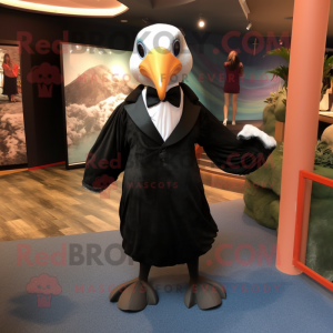 Black Albatross mascot costume character dressed with a Wrap Dress and Bow ties