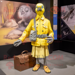 Lemon Yellow Passenger Pigeon mascot costume character dressed with a Bomber Jacket and Clutch bags