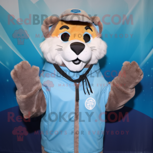 Sky Blue Mountain Lion mascot costume character dressed with a Parka and Scarf clips