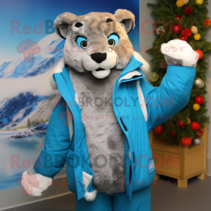 Personaje de traje de mascota Sky Blue Mountain Lion vestido con una parka y clips de bufanda