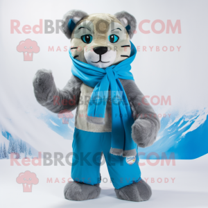 Sky Blue Mountain Lion mascot costume character dressed with a Parka and Scarf clips