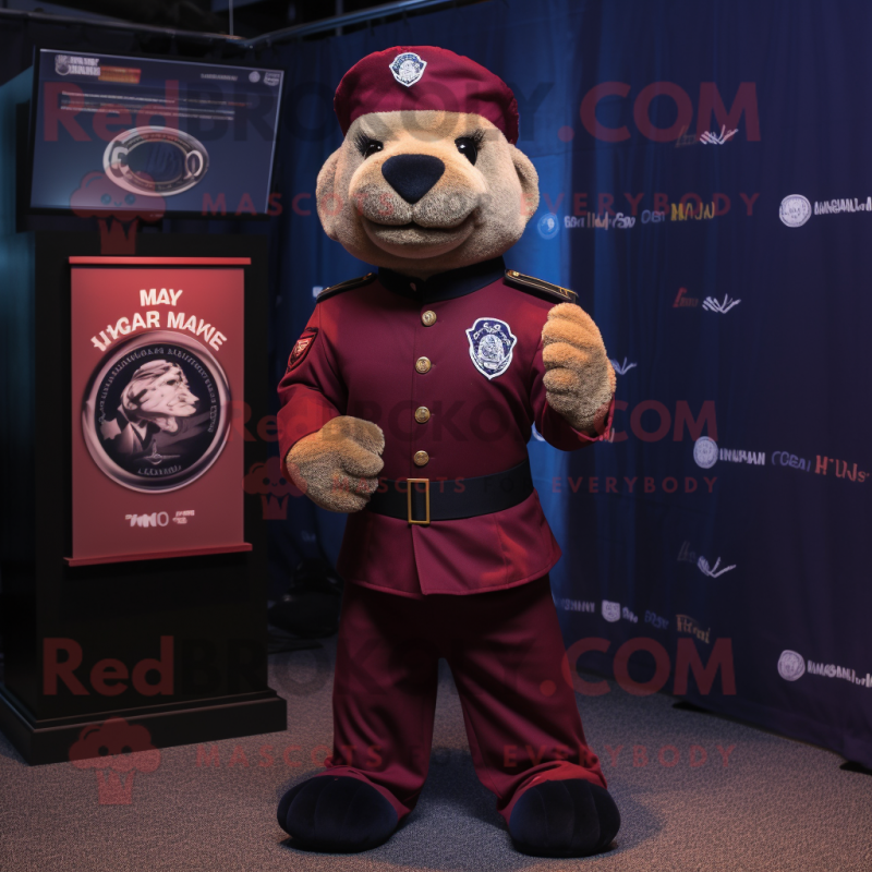 Maroon Navy Seal mascot costume character dressed with a Playsuit and Lapel pins Maroon Navy Seal mascot costume character dressed with a Playsuit and Lapel pins