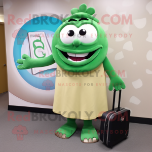 Grøn Bagels maskot kostume karakter klædt med en Maxi nederdel og dokumentmapper