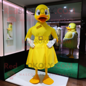 Lemon Yellow Duck mascot costume character dressed with a Shift Dress and Belts