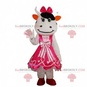 White and black cow costume wearing a pink dress -