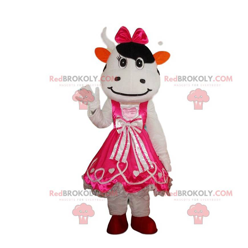 White and black cow costume wearing a pink dress -
