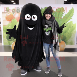 Black Celery mascot costume character dressed with a Boyfriend Jeans and Scarves