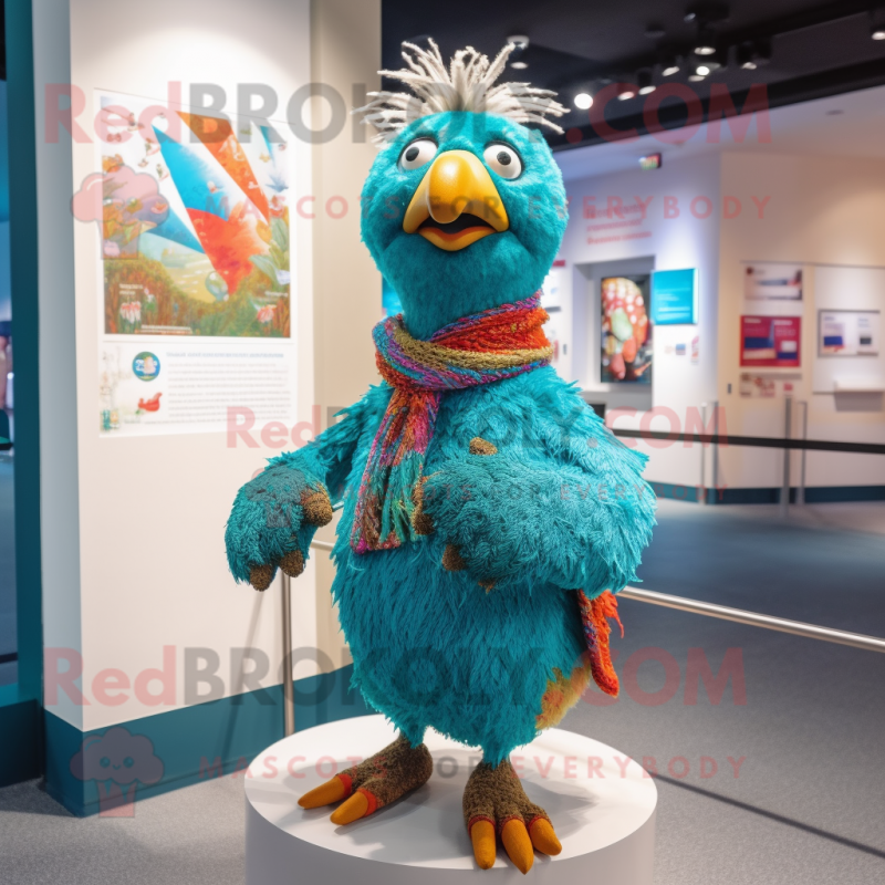 Turquoise Pheasant mascot costume character dressed with a Cardigan and Bracelets