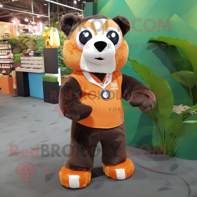 Orange Spectacled Bear mascot costume character dressed with a Romper and Keychains Orange Spectacled Bear mascot costume character dressed with a Romper and Keychains