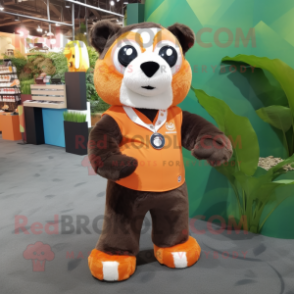 Orange Spectacled Bear mascot costume character dressed with a Romper and Keychains