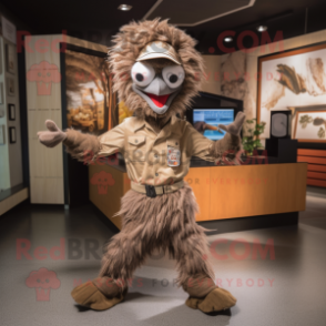 Brown Emu mascot costume character dressed with a Trousers and Headbands