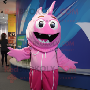 Pink Swordfish mascot costume character dressed with a Sweatshirt and Hair clips
