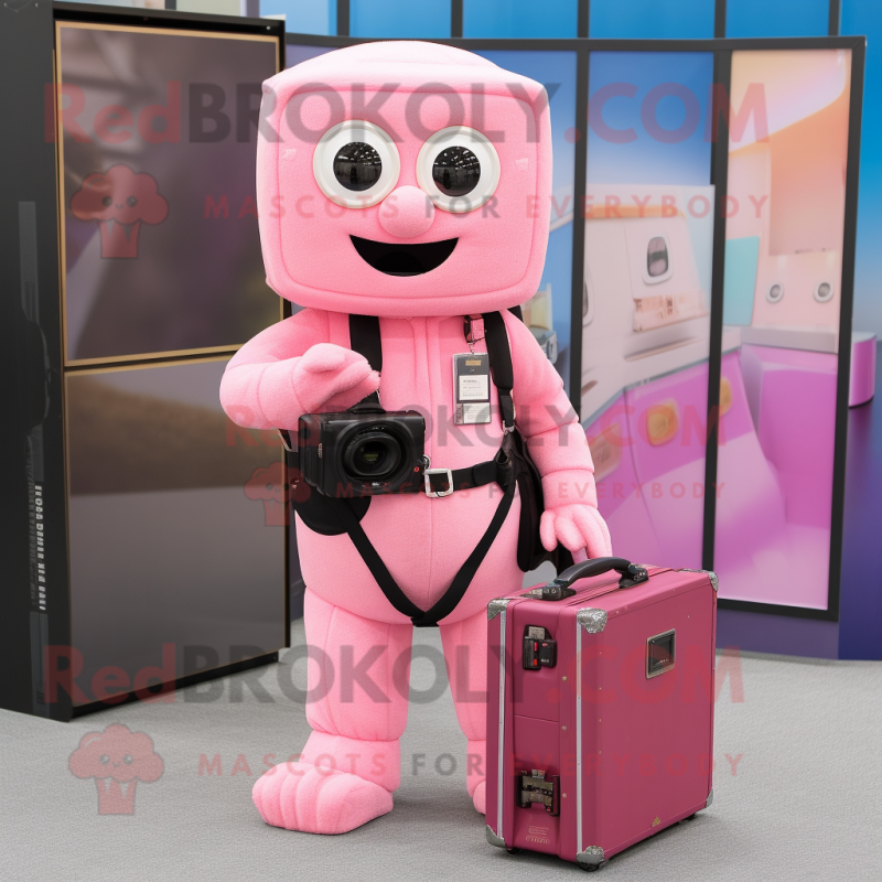 Pink Camera mascot costume character dressed with a Jumpsuit and Briefcases Pink Camera mascot costume character dressed with a Jumpsuit and Briefcases