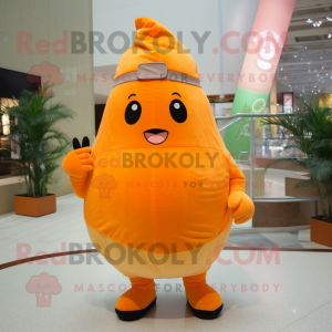 Orange Pear mascot costume character dressed with a T-Shirt and Beanies