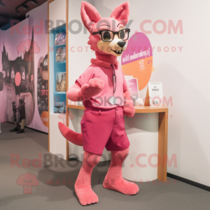 Pink Dingo mascot costume character dressed with a Culottes and Eyeglasses