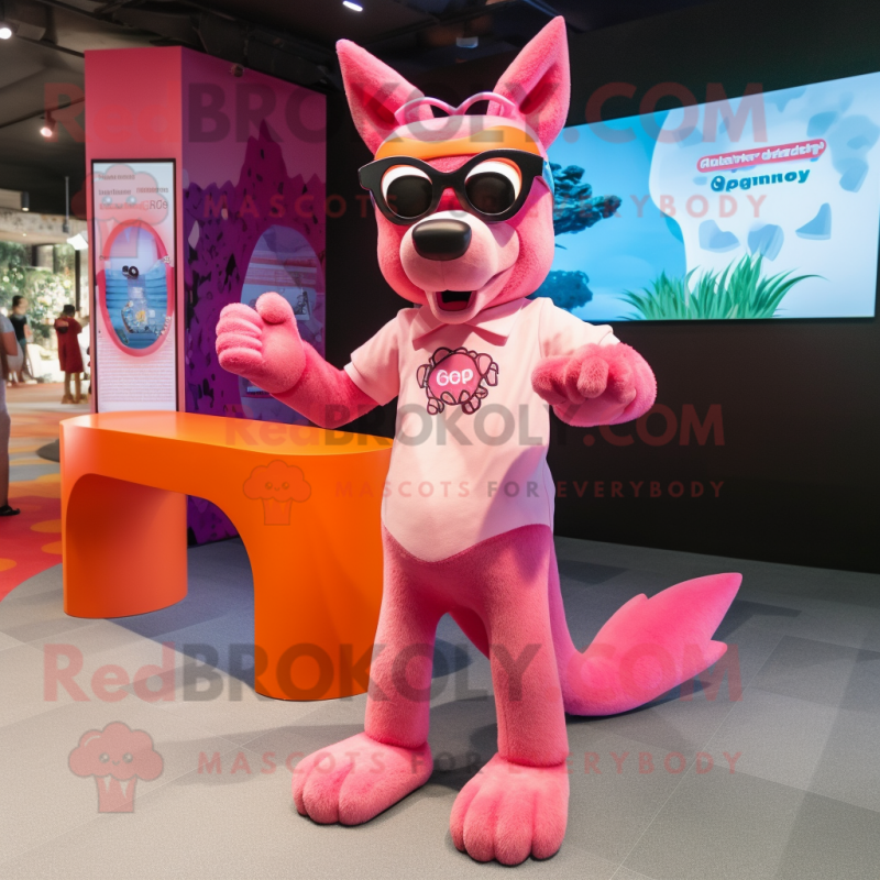 Pink Dingo mascot costume character dressed with a Culottes and Eyeglasses Pink Dingo mascot costume character dressed with a Culottes and Eyeglasses