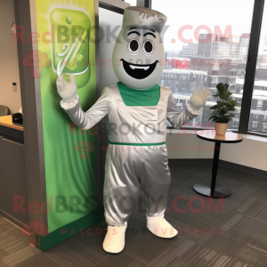 Silver Pesto Pasta mascot costume character dressed with a Jumpsuit and Shoe clips