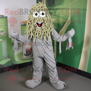 Silver Pesto Pasta mascot costume character dressed with a Jumpsuit and Shoe clips