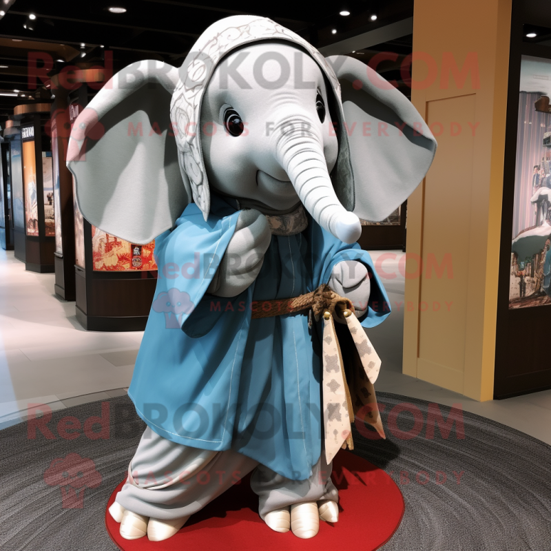 nan Elephant mascot costume character dressed with a Coat and Shawls