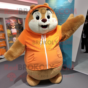 Peach Marmot mascot costume character dressed with a Sweatshirt and Wraps