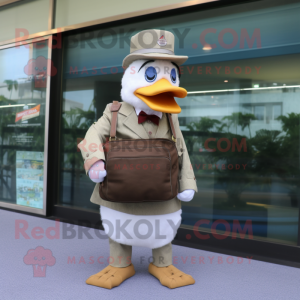 Beige Muscovy Duck mascot costume character dressed with a Suit and Messenger bags