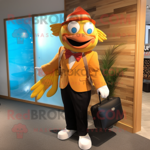 Gold Clown Fish mascot costume character dressed with a Suit Jacket and Tote bags