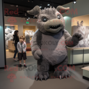 Gray Woolly Rhinoceros mascot costume character dressed with a Jeggings and Shoe clips