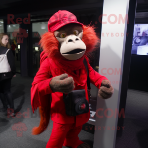Red Baboon mascot costume character dressed with a Suit Pants and Scarves