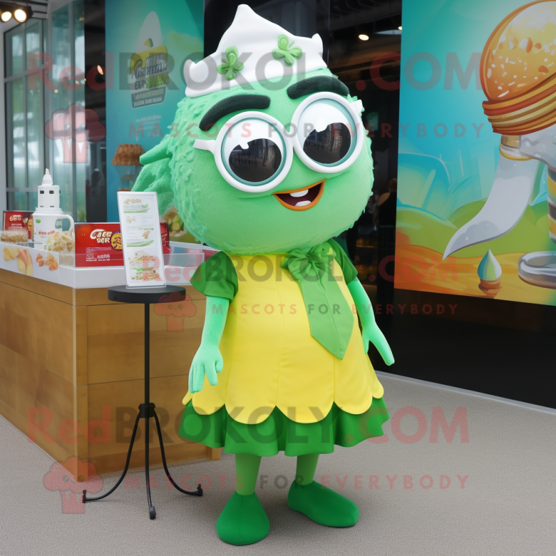 Green Fish And Chips mascot costume character dressed with a A-Line Skirt and Eyeglasses Green Fish And Chips mascot costume character dressed with a A-Line Skirt and Eyeglasses
