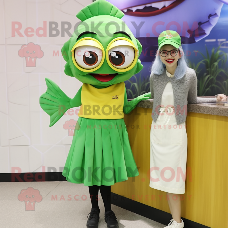 Green Fish And Chips mascot costume character dressed with a A-Line Skirt and Eyeglasses Green Fish And Chips mascot costume character dressed with a A-Line Skirt and Eyeglasses