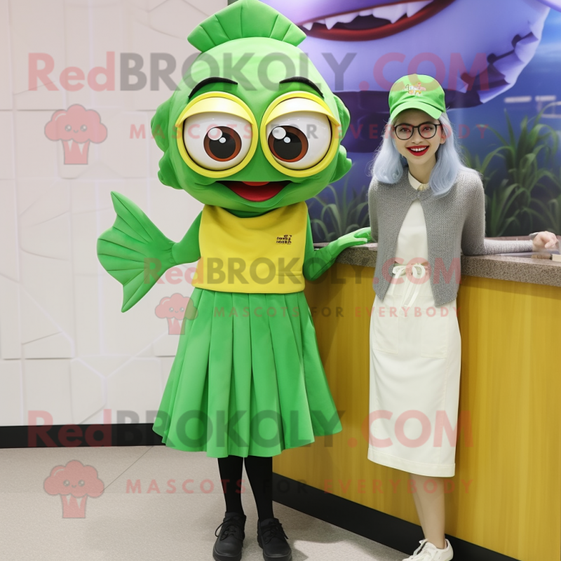 Green Fish And Chips mascot costume character dressed with a A-Line Skirt and Eyeglasses