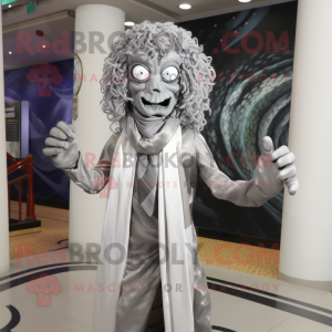 Silver Medusa mascot costume character dressed with a Suit Pants and Scarves