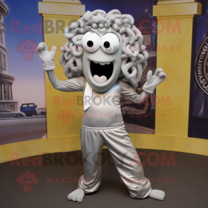 Silver Medusa mascot costume character dressed with a Suit Pants and Scarves