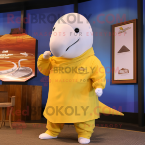 Gold Beluga Whale mascot costume character dressed with a Polo Tee and Shawl pins