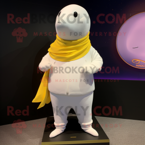 Gold Beluga Whale mascot costume character dressed with a Polo Tee and Shawl pins