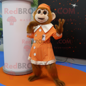 Orange Capuchin Monkey mascot costume character dressed with a Skirt and Rings