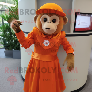 Orange Capuchin Monkey mascot costume character dressed with a Skirt and Rings