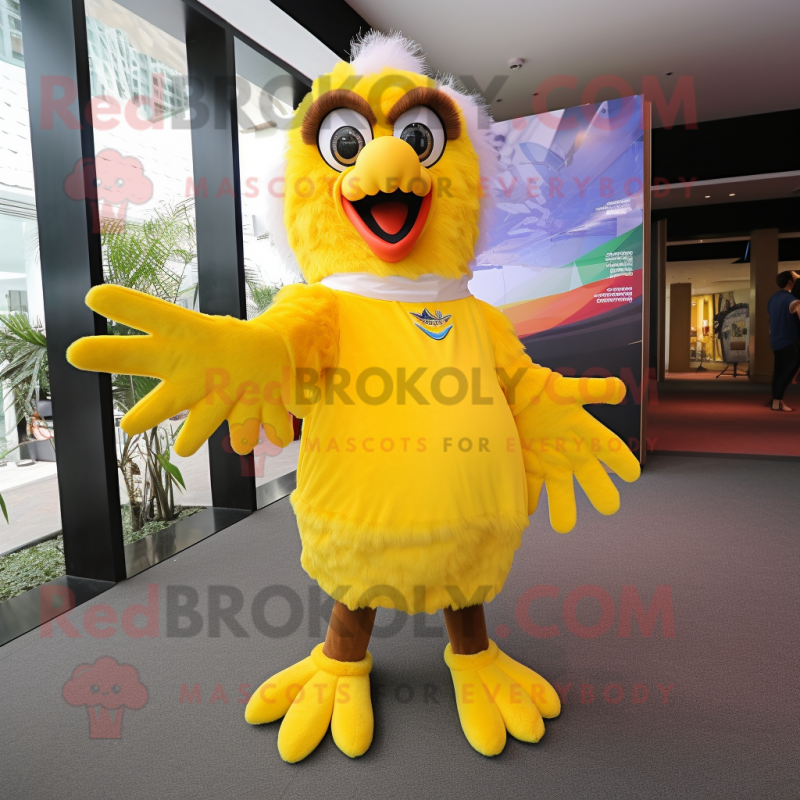 Yellow Eagle mascot costume character dressed with a Mini Dress and Mittens Yellow Eagle mascot costume character dressed with a Mini Dress and Mittens