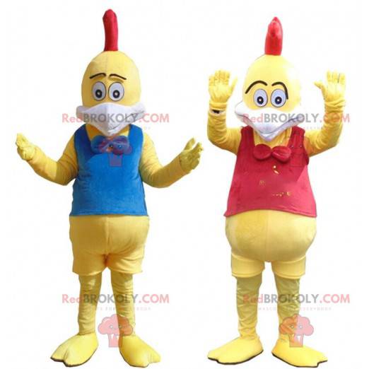 Kostuums van gele kippen, mascottes van kleurrijke hanen -
