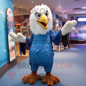 Blue Bald Eagle mascot costume character dressed with a Blouse and Mittens