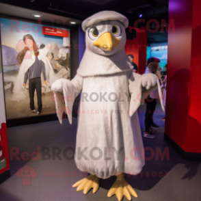 Silver Albatross mascot costume character dressed with a Empire Waist Dress and Beanies