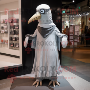 Silver Albatross mascot costume character dressed with a Empire Waist Dress and Beanies