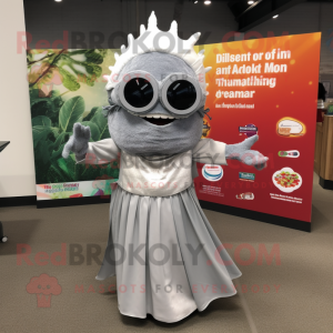 Silver Tacos mascot costume character dressed with a Maxi Dress and Reading glasses