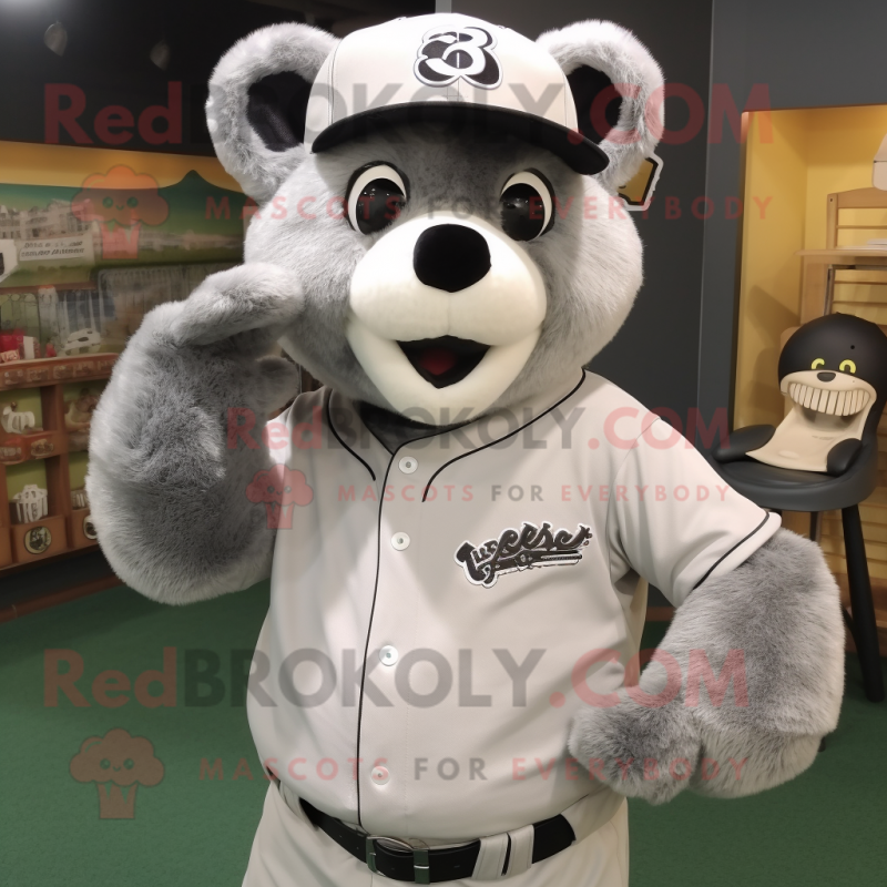 Silver Spectacled Bear mascot costume character dressed with a Baseball Tee and Keychains