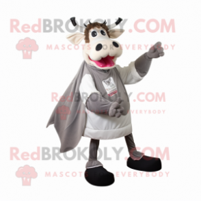 Gray Holstein Cow mascot costume character dressed with a A-Line Dress and Foot pads