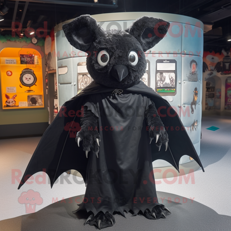 Black Bat mascot costume character dressed with a Cover-up and Cummerbunds Black Bat mascot costume character dressed with a Cover-up and Cummerbunds