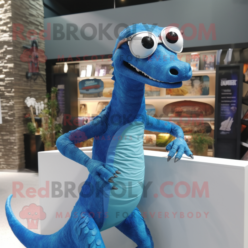 Blue Coelophysis mascot costume character dressed with a V-Neck Tee and Eyeglasses