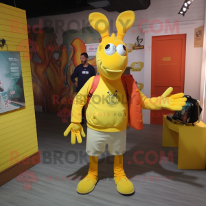 Yellow Lobster mascot costume character dressed with a Sweatshirt and Tote bags