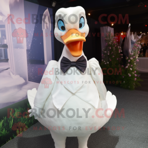 White Swans mascot costume character dressed with a Blouse and Bow ties