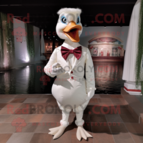 White Swans mascot costume character dressed with a Blouse and Bow ties